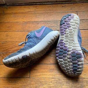 Womens Nike size 9. Light blue with light purple stitching.